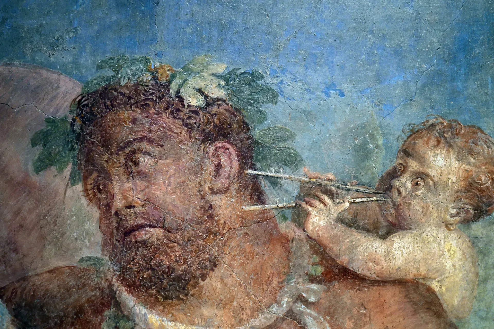 Μεθυσμένος Ηρακλής και ερωτιδέας, λεπτομέρεια από τοιχογραφία Ηρακλή και Ομφάλης, από την Οικία του Μάρκου Λουκρήτιου στην Πομπηία, Museo archeologico nazionale di Napoli.